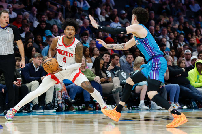 Rockets guard Jalen Green (4) shoots against Charlotte Hornets guard LaMelo Ball (1) during the second half at Spectrum Center.